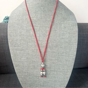 Sparkly necklace with silver and cz type stones on red leather cord adju…